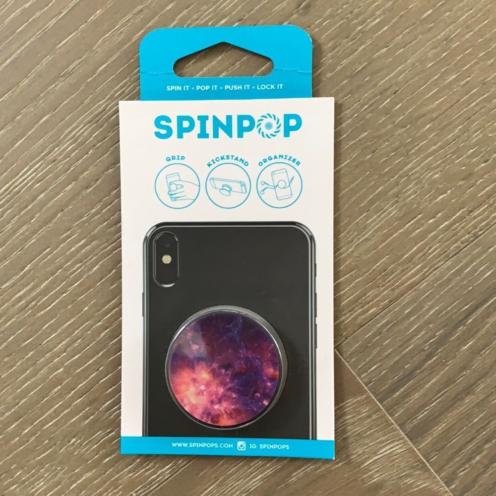 Spinpop To Hold Phone Cables Or Use As A Stand Spinpop To Hold Phone Cables Or Use As A Stand